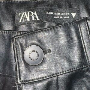 Black faux, leather Zara pants with seam running down the front